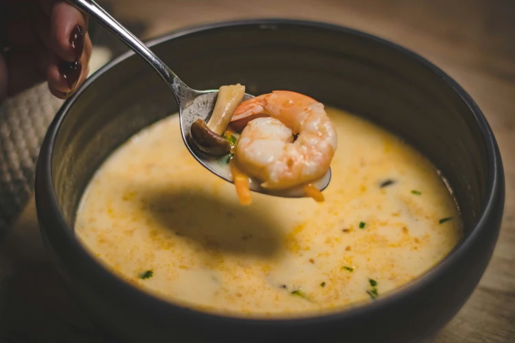 Soup with shrimp in it in a bowl