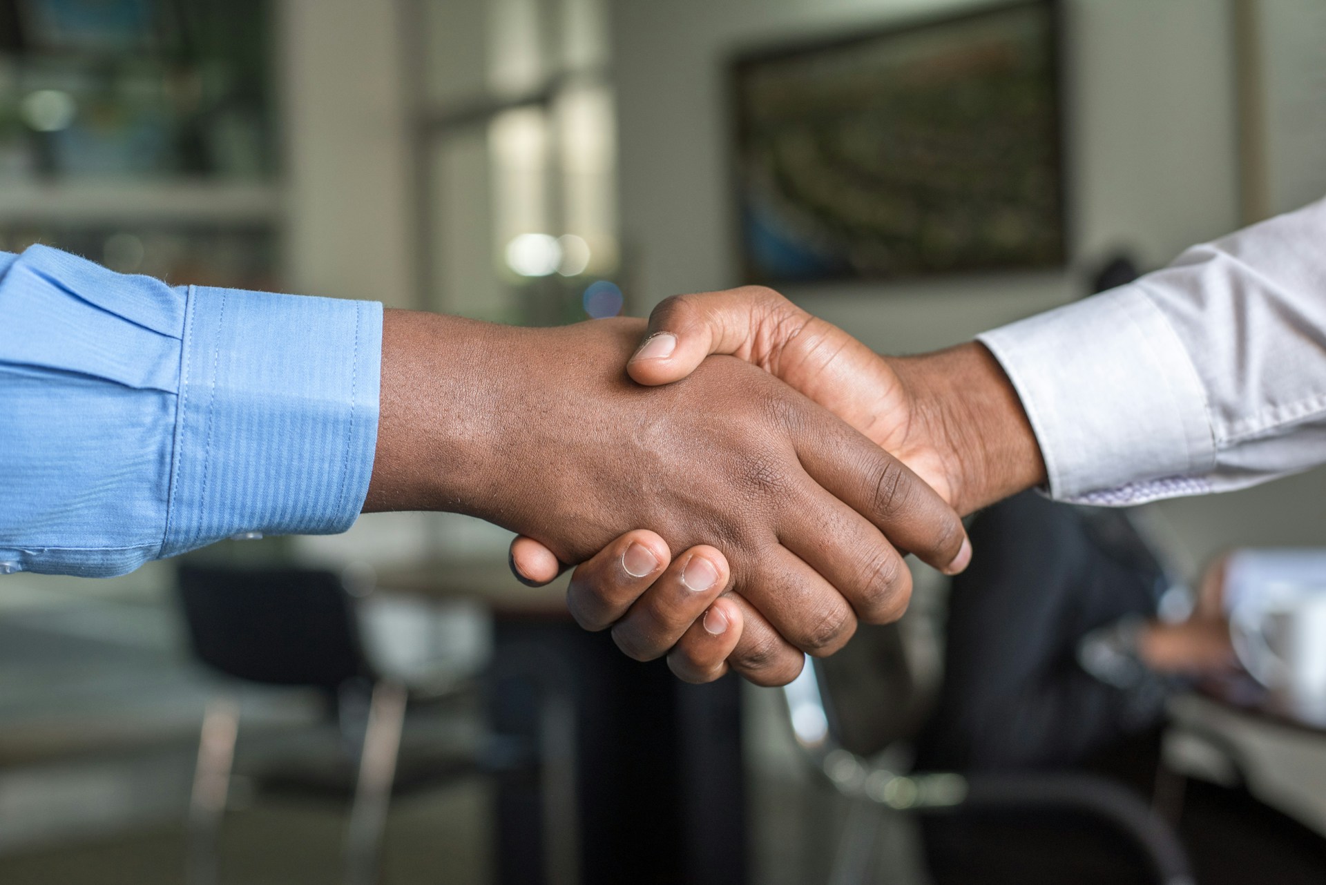 A handshake between The Cleaning Clan and a client, sealing trust
