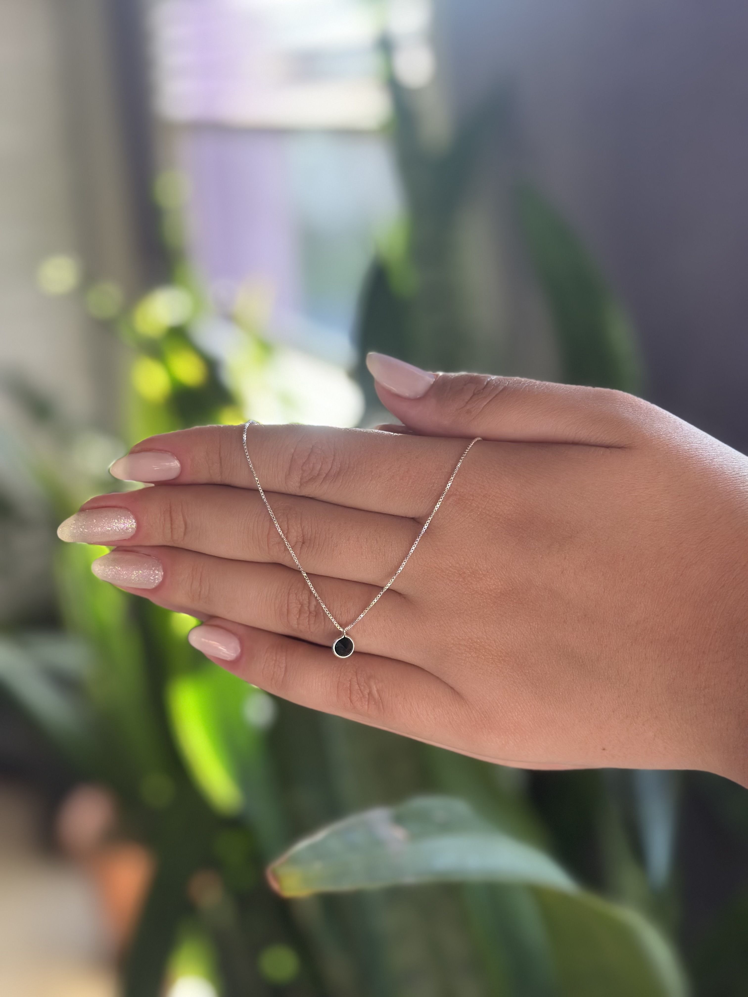 Colar ponto de luz preto