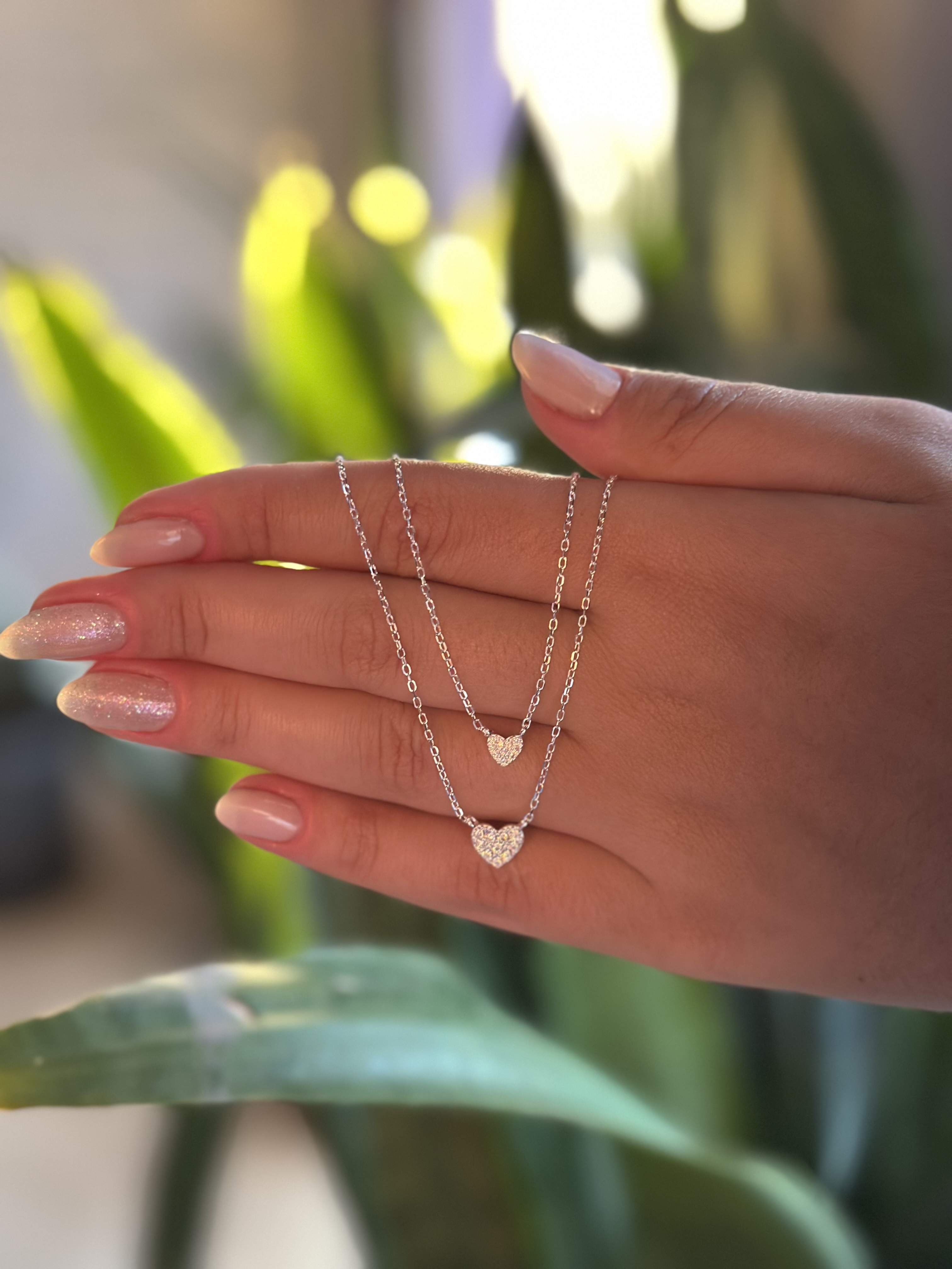 Colar duplo coração cravejado