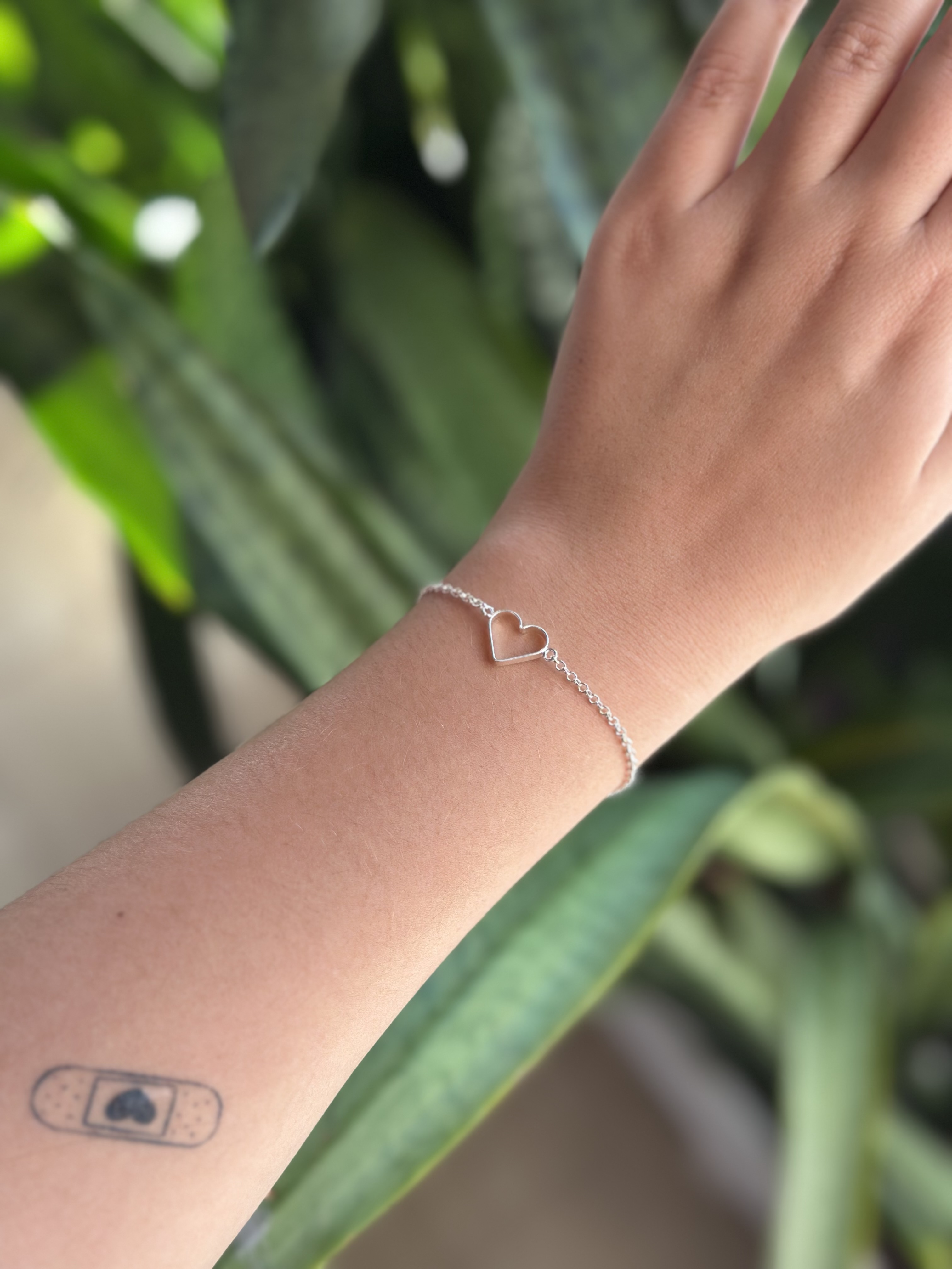 Pulseira coração vazado 