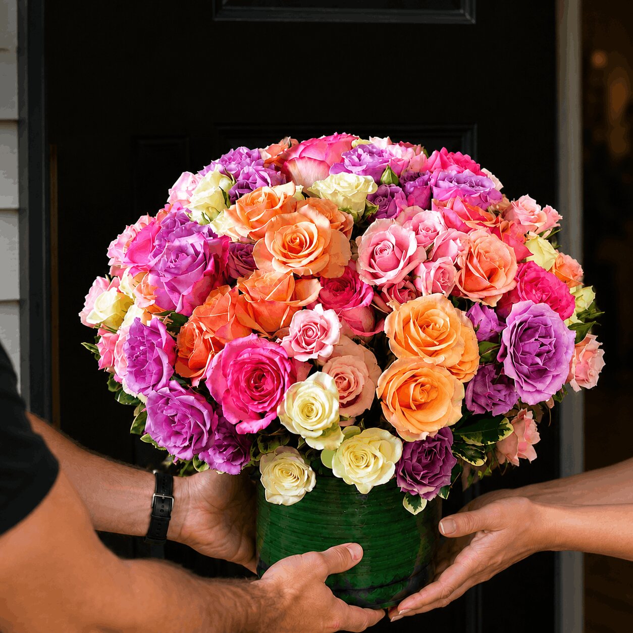 Fresh flower delivery handoff for Reading MA from Designs By Don Florist