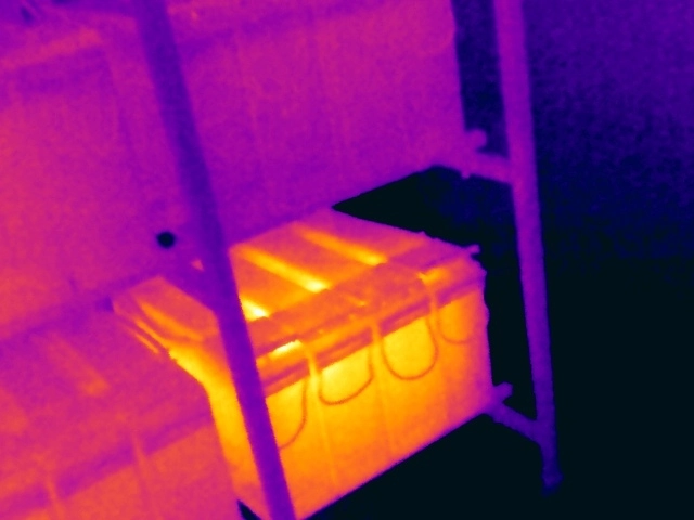 Thermal image showing an abnormal temperature pattern within a UPS battery bank, indicating a developing battery or connection issue