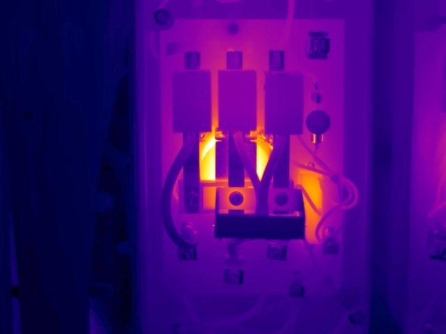 Thermal image showing excessive temperature at a contactor control coil, indicating possible winding degradation