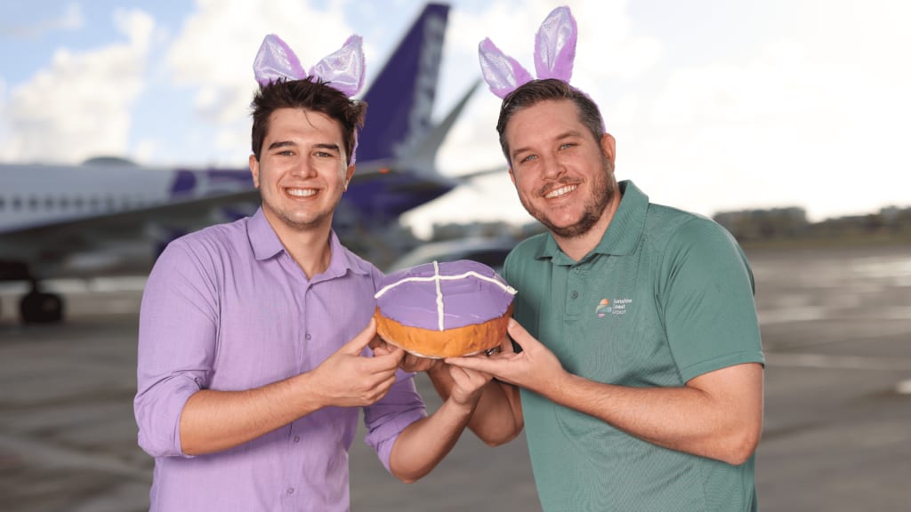 Airport staff with Bonza hotXnut and Easter bunny ears
