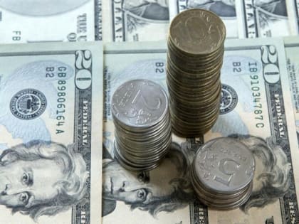 Курс доллара просел на 1,27 рубля, евро теряет 75 копеек