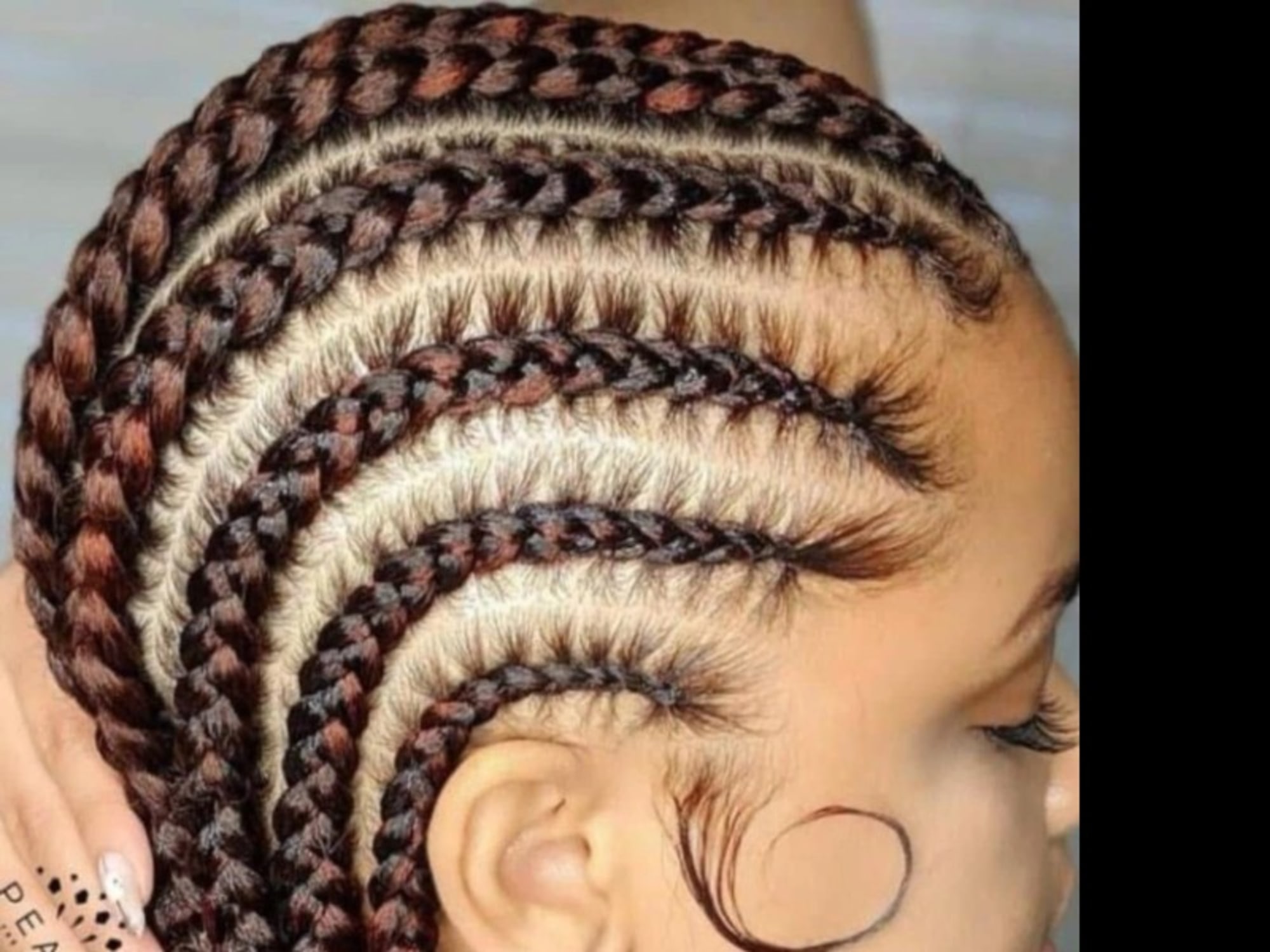 Feed-In Braids by Ideal African Hair Braiding in Houston, TX