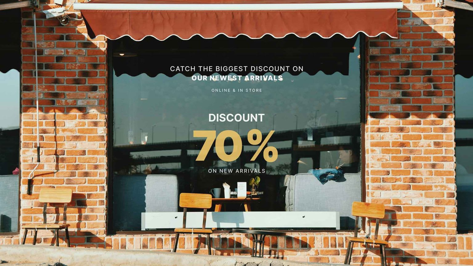 Free Storefront Vinyl Logo Mockup (PSD) - Image 1