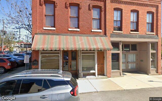 Street-level view of Rhizome Roots Studio