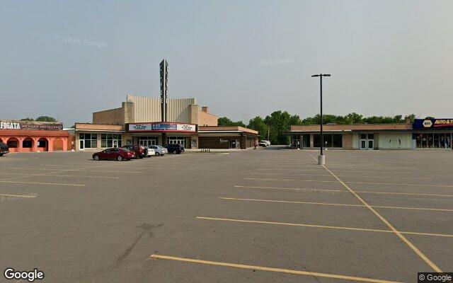 Street-level view of Crescendo Coffee & More
