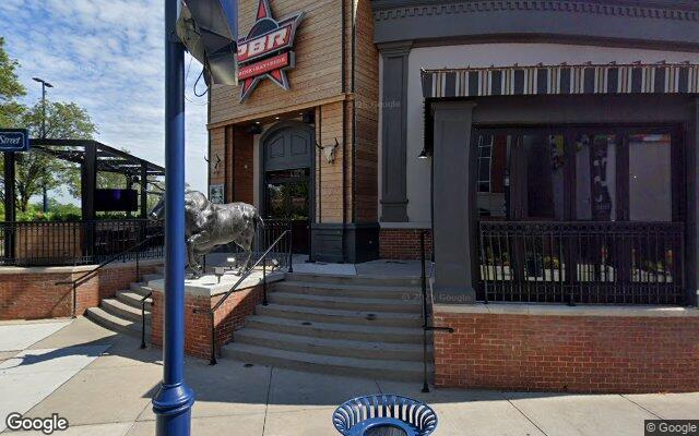 Street-level view of PBR Cowboy Bar + Smokehouse