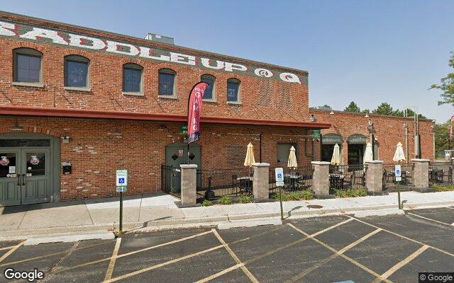 Street-level view of Saddle Up at Q Eatery & Saloon