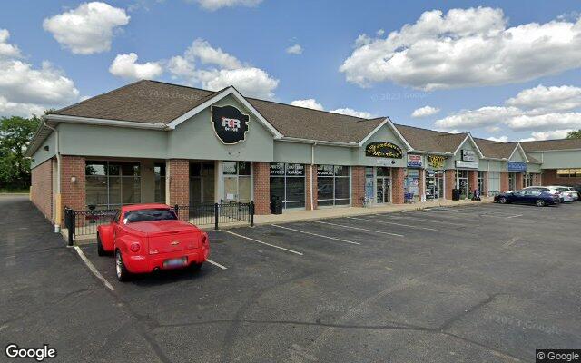 Street-level view of Black Swan Bar & Grill