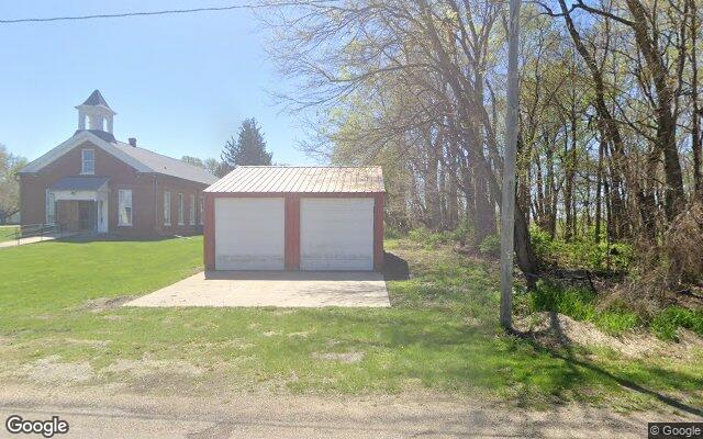 Street-level view of Old Colony School (barn dance) / Village Park (Maypole)