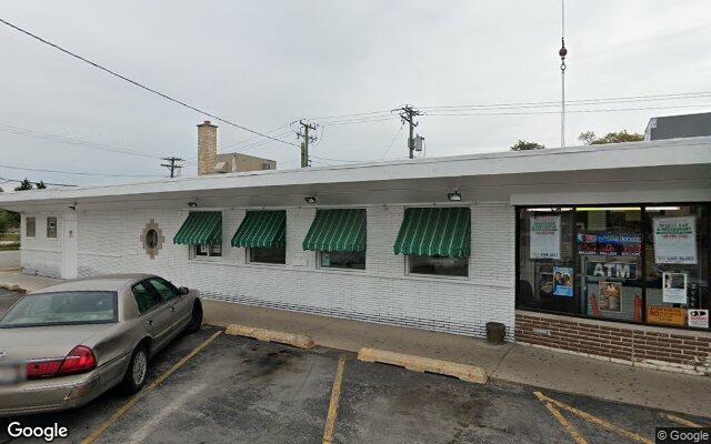 Street-level view of Geno's Bar & Grill
