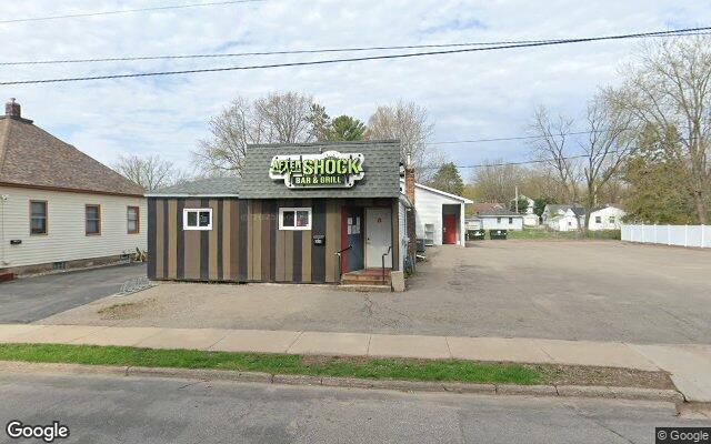 Street-level view of Aftershock Bar & Grill