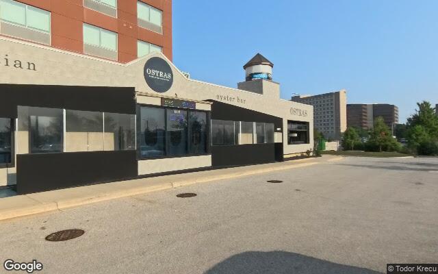 Street-level view of Ostras Lounge & Oyster Bar
