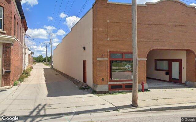 Street-level view of The Ideal Theater & Bar