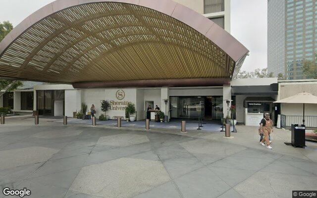 Street-level view of Sheraton Universal Hotel