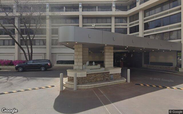 Street-level view of Crowne Plaza Executive Center