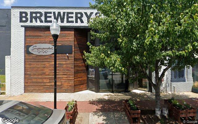 Street-level view of Mystique Barrel Brewing and Lager House