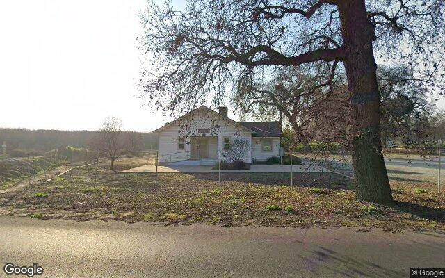 Street-level view of West Visalia Grange