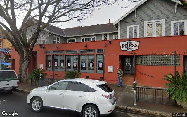 Street-level view of Press Club