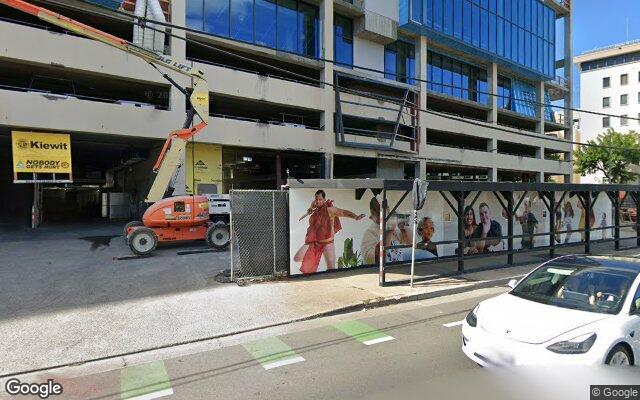 Street-level view of The Honolulu Club (7th Floor)