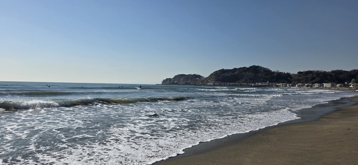 Surfers in the line-up off Yuigahama Beach