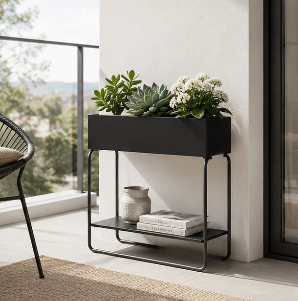 Black metal planter stand with flowers and greenery on a modern balcony