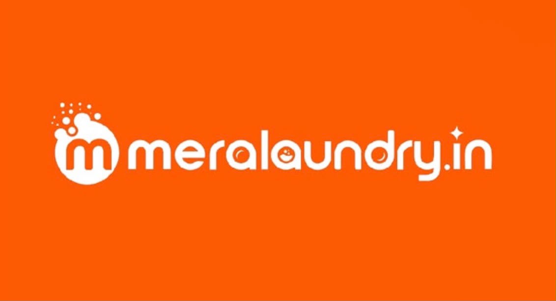A professional laundry service outlet setup with garment cleaning and steam ironing equipment in India