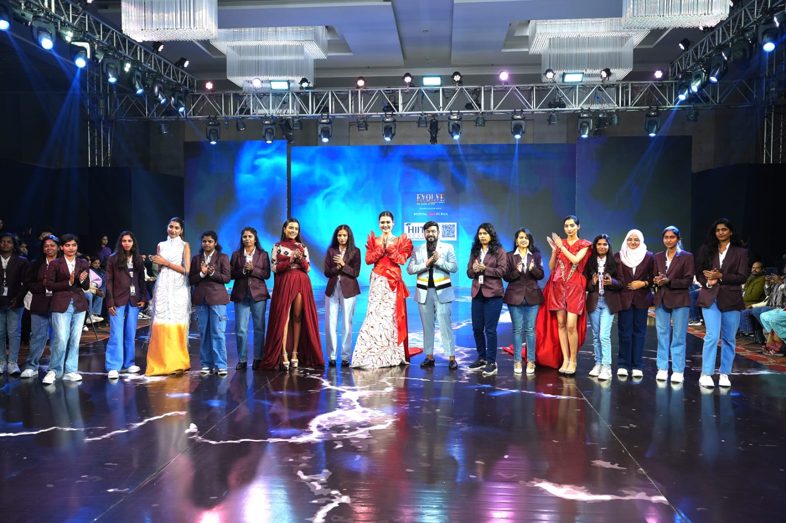 Fashion design students working on garment construction and pattern making at a studio in Hyderabad