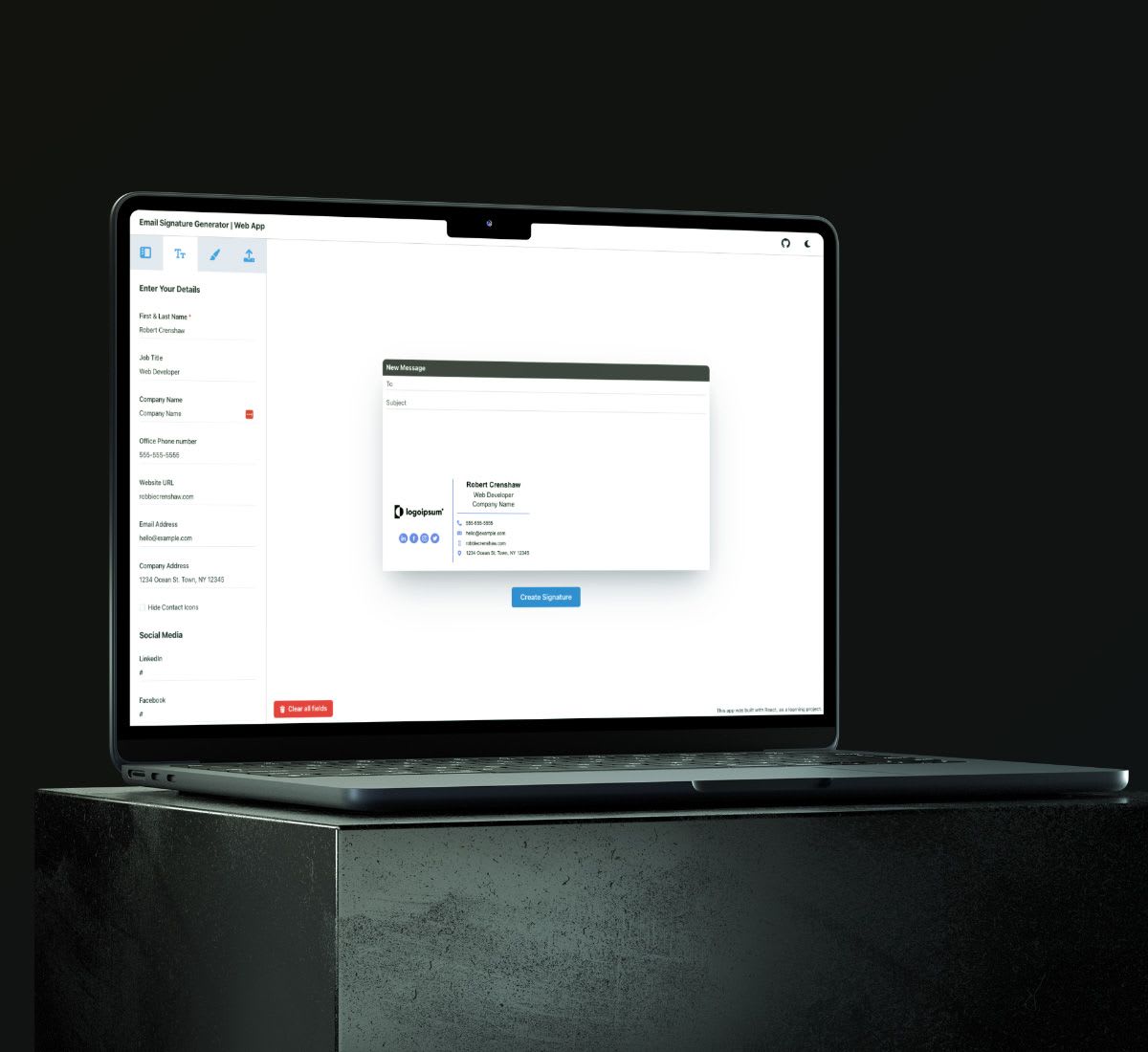 a macbook on a stand which is displaying the email signature app
