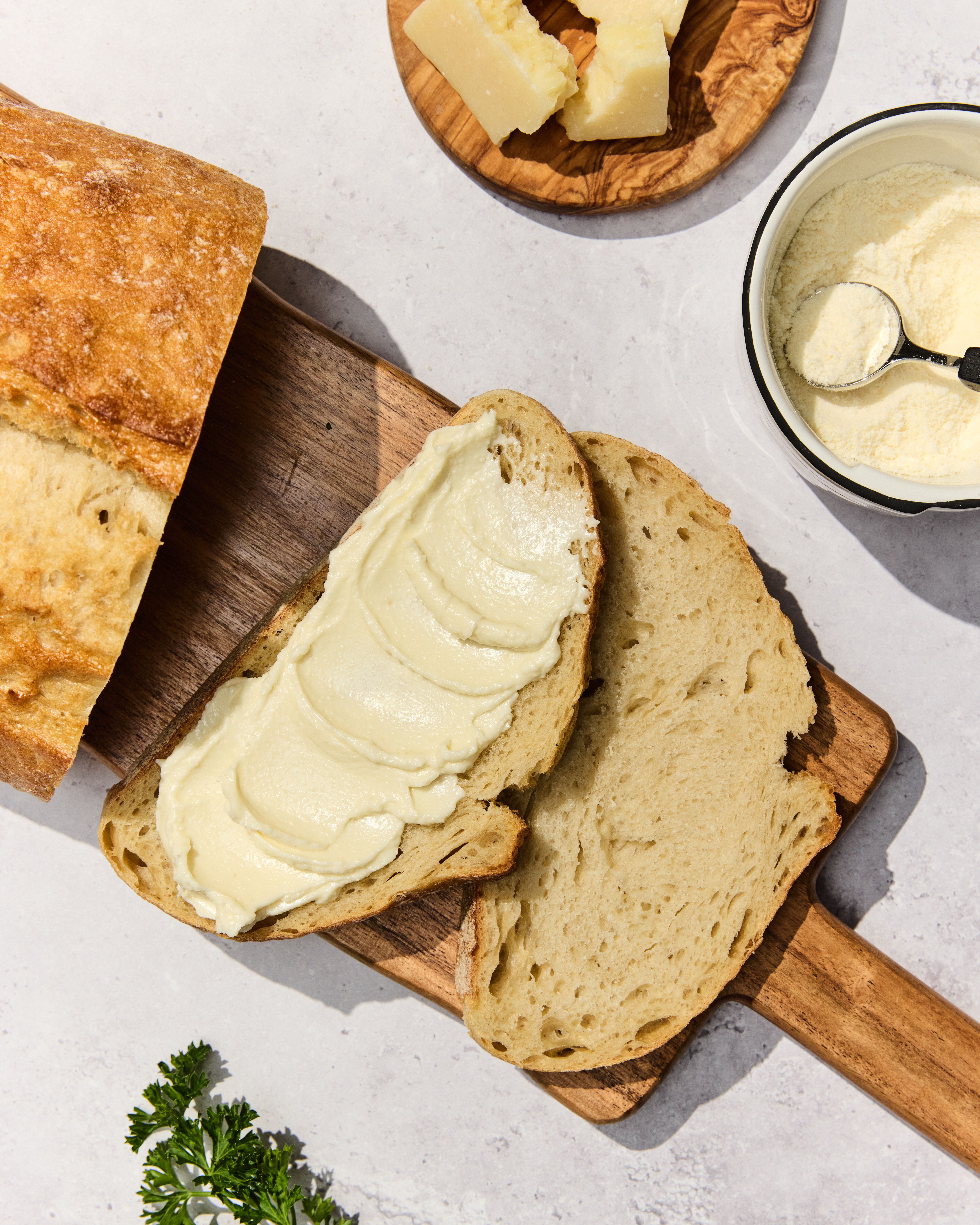Brala's Best Original Pouch, Cheese, parsley, bread and cutting board