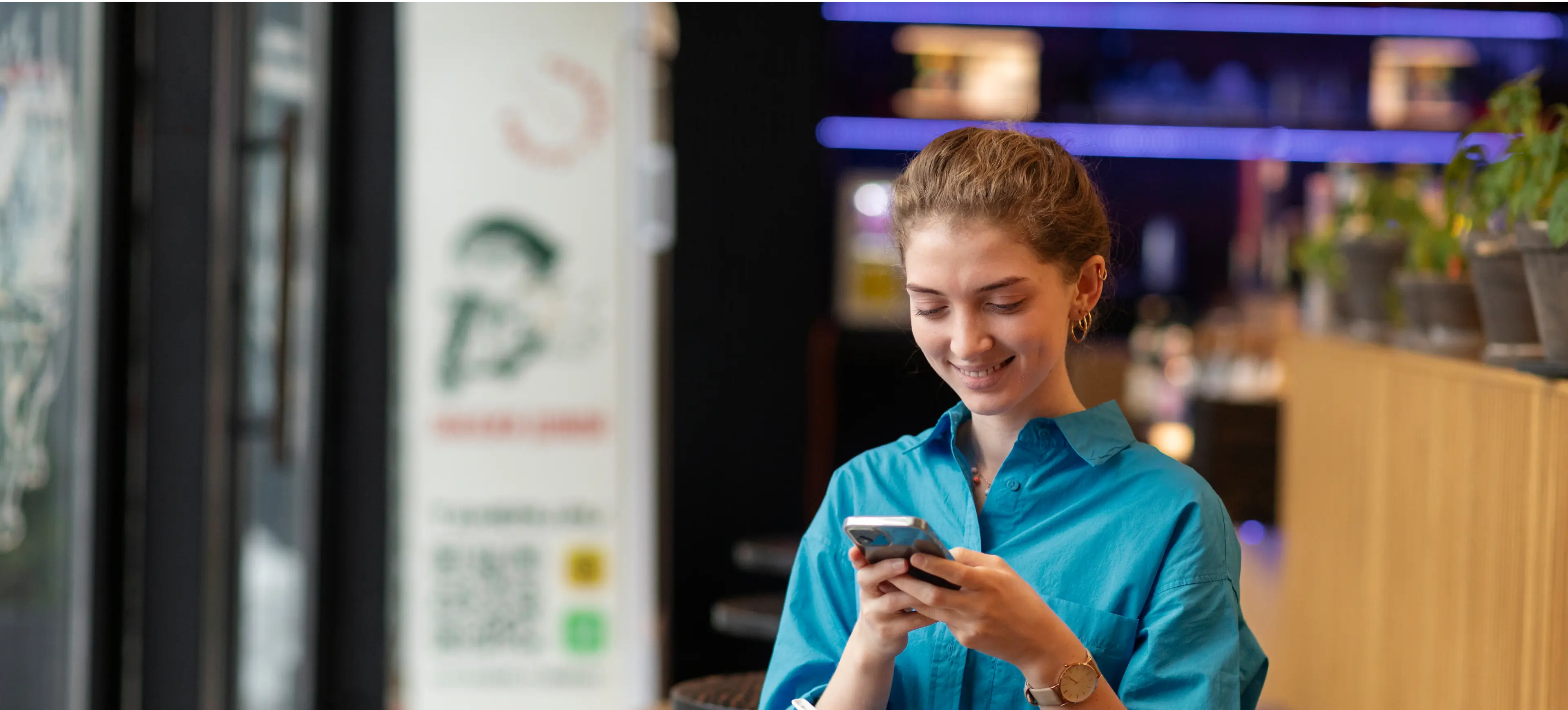 a woman using a cellphone