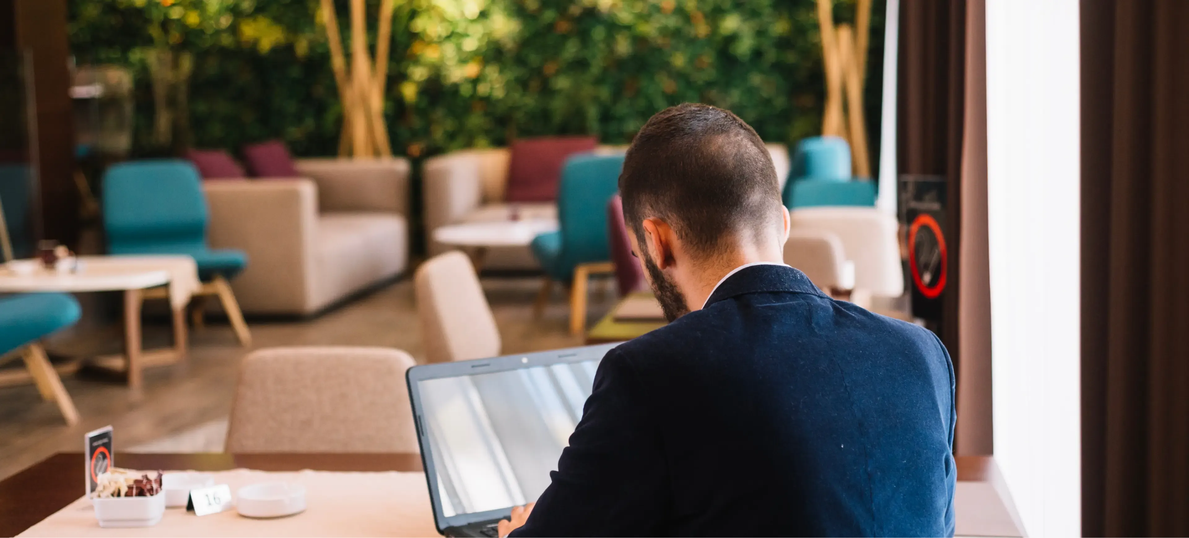 a man reading a menu