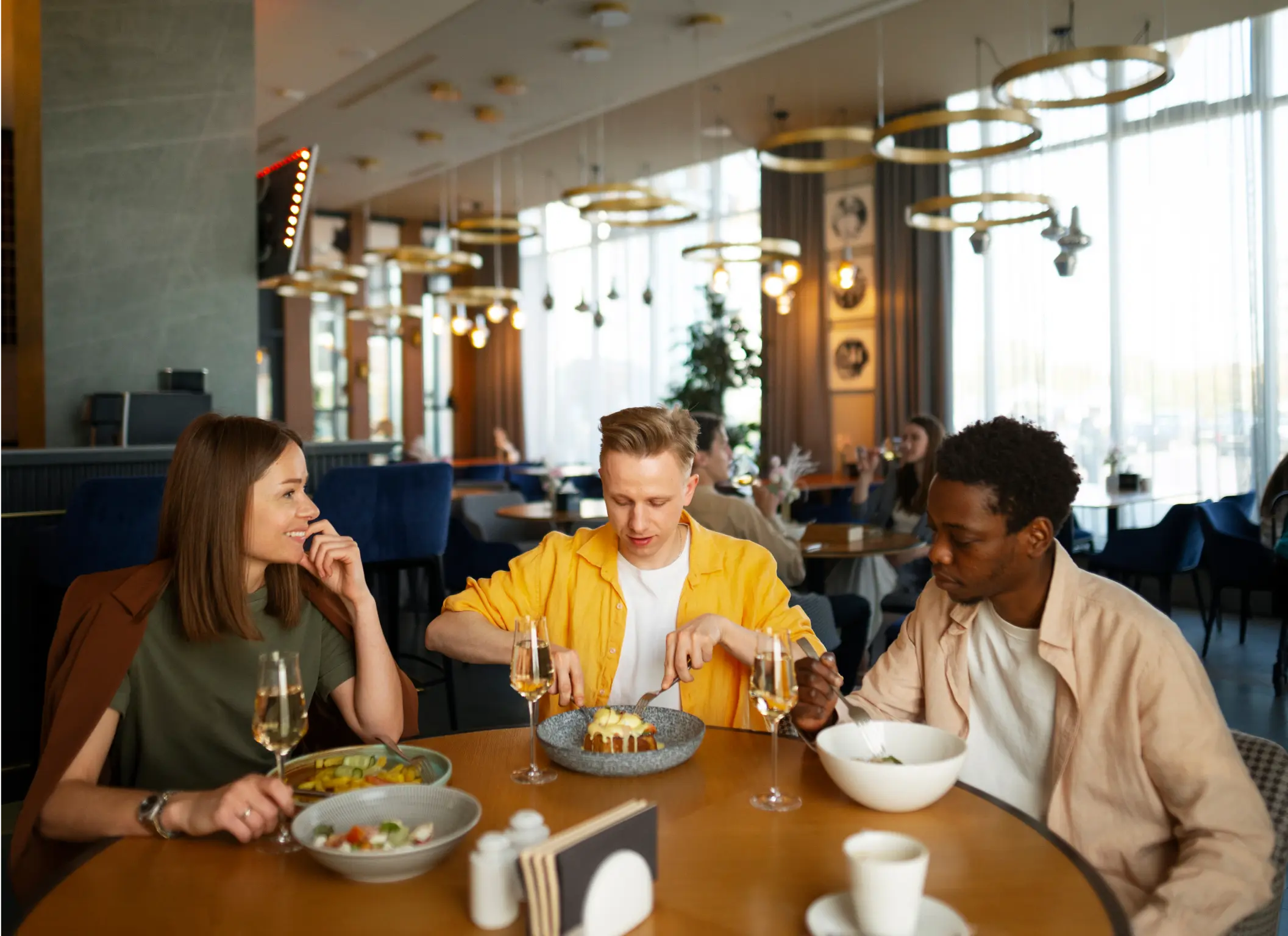 three friends eating food