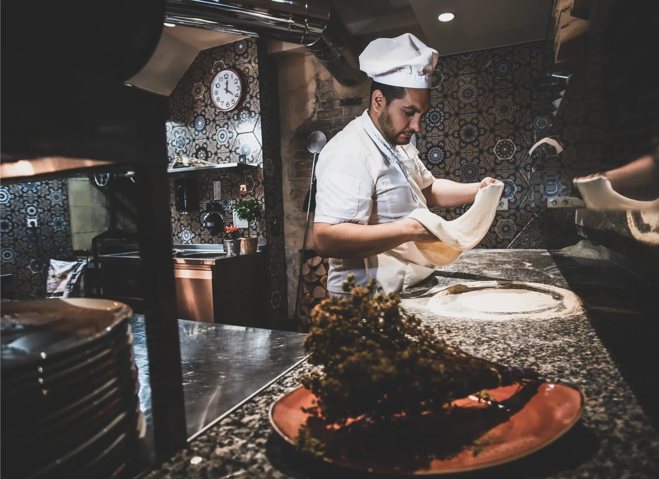 a man making pizza