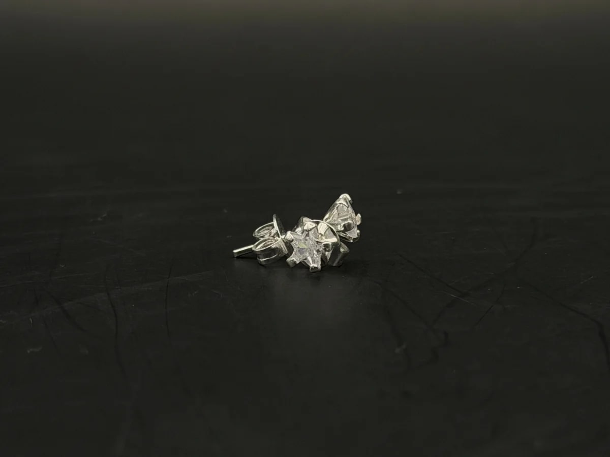Broquel Zirconia blanca de estrella 4mm de plata .925