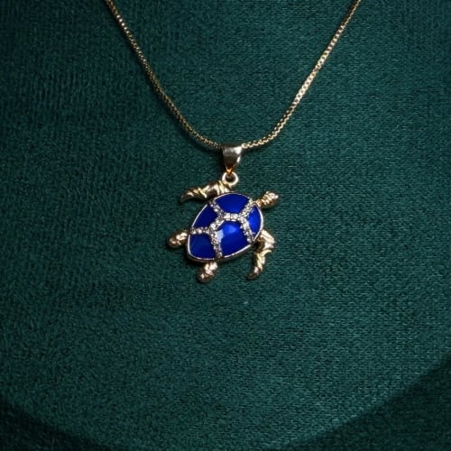 Dije Tortuga Chapa de Oro 18k con Piedras