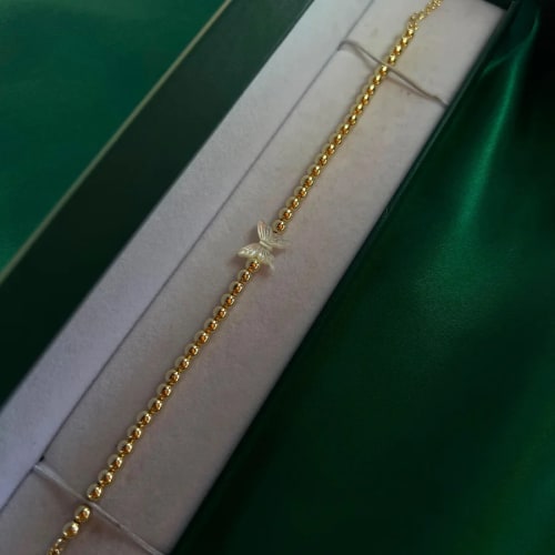 Pulsera Cadena de Bolitas con Mariposa en Chapa de Oro 18k
