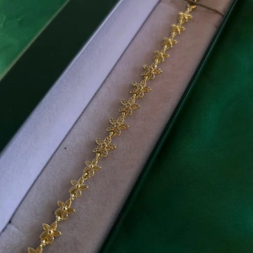 Pulsera de Flores Continuas en Chapa de Oro 18k