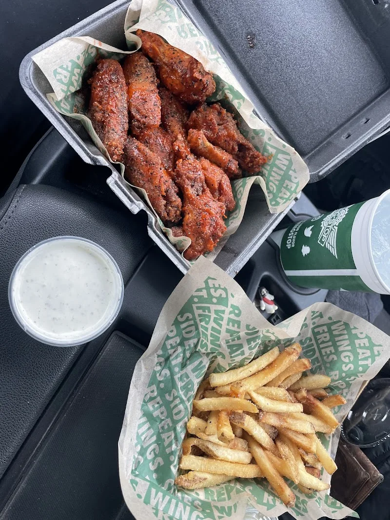 Wingstop food and storefront view at 6518 Atlanta Highway in Montgomery, Alabama