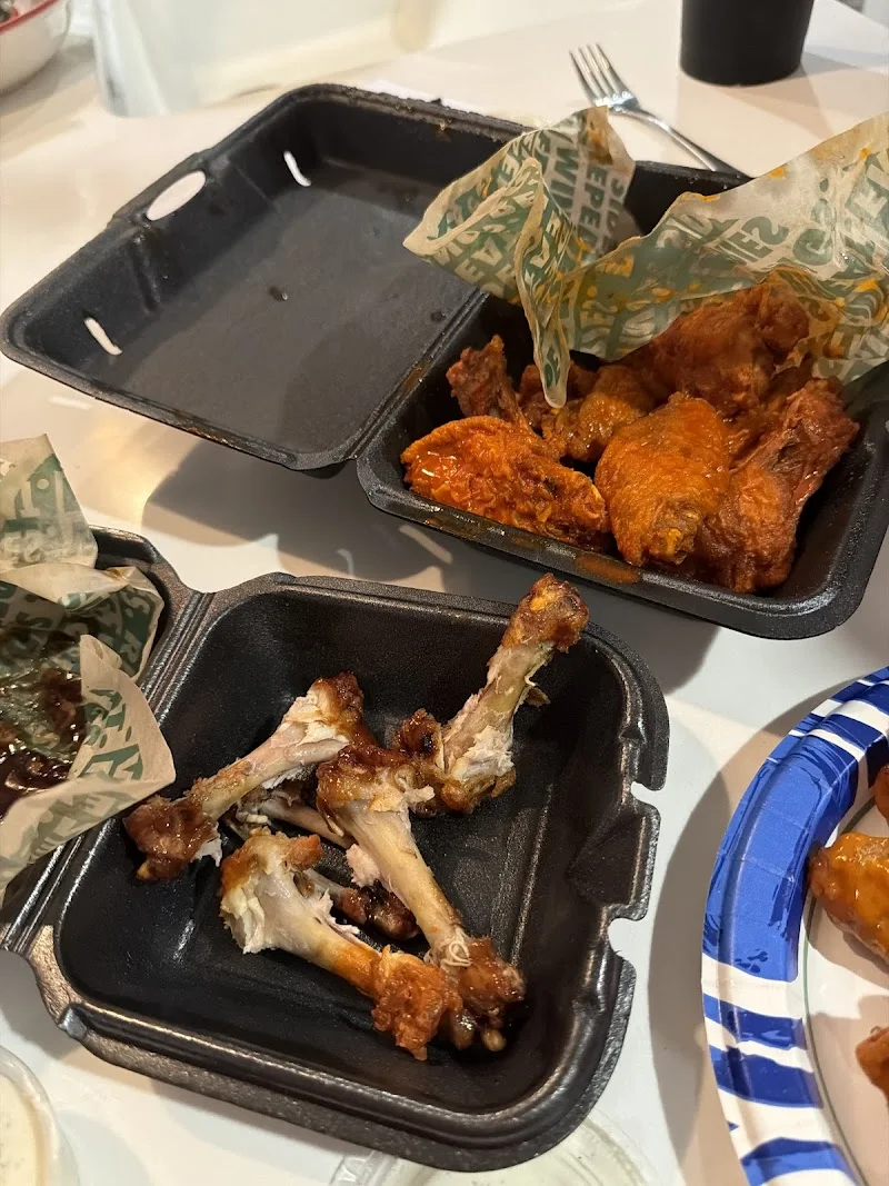 Wingstop food and storefront view at 7268 Gadsden Hwy Suite 104 in Trussville, Alabama