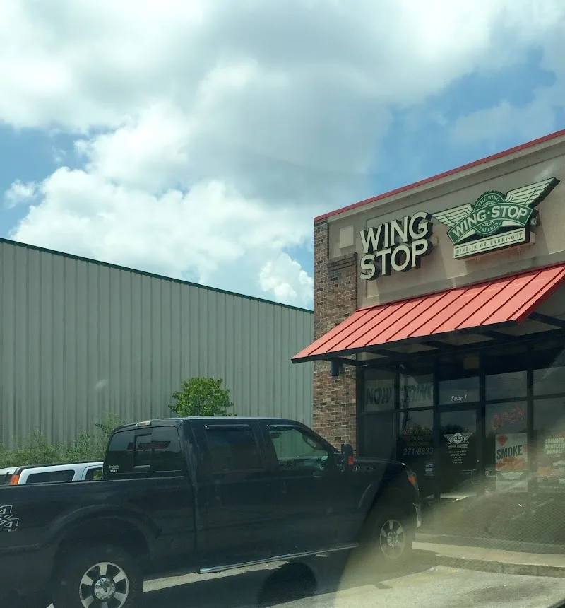 Wingstop food and storefront view at 231 N Walton Blvd in Bentonville, Arkansas
