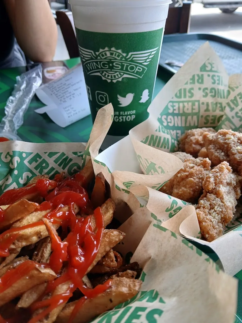 Wingstop food and storefront view at 1237 Martin Luther King Blvd in Fayetteville, Arkansas