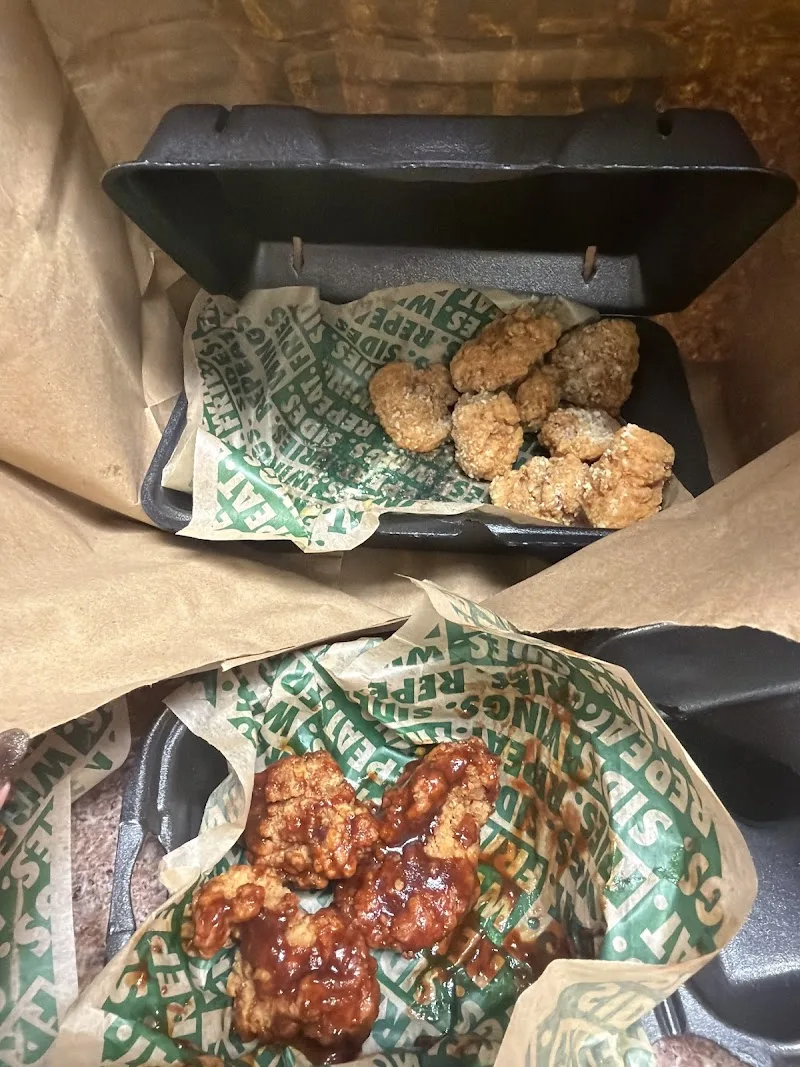 Wingstop food and storefront view at 3200 E Hwy 412 50 in Siloam Springs, Arkansas