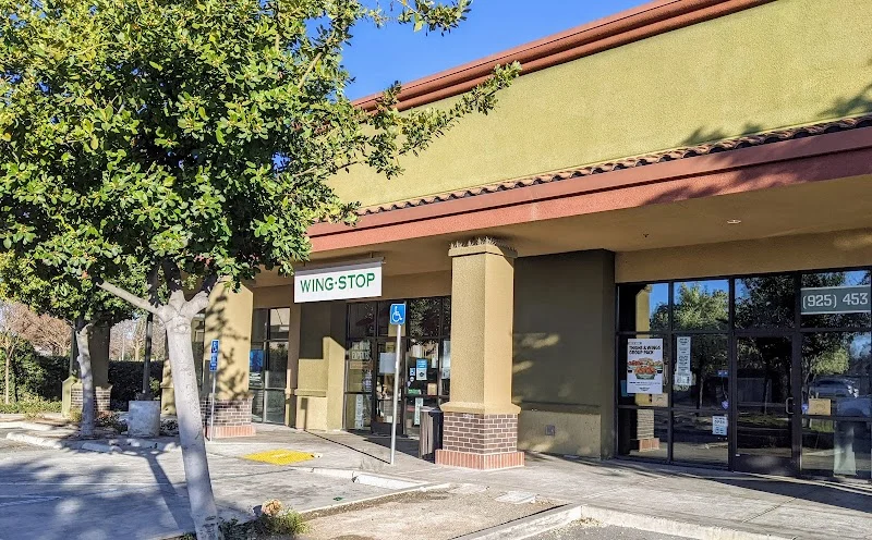 Wingstop food and storefront view at 6471 Lone Tree Way in Brentwood, California