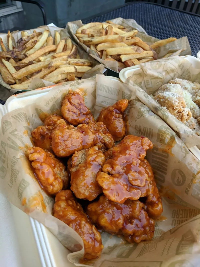 Wingstop food and storefront view at 11445 South St in Cerritos, California