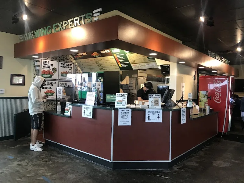 Wingstop food and storefront view at 10015 Valley View St in Cypress, California